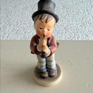 Charming Figurine with Black Hat and Brown Coat